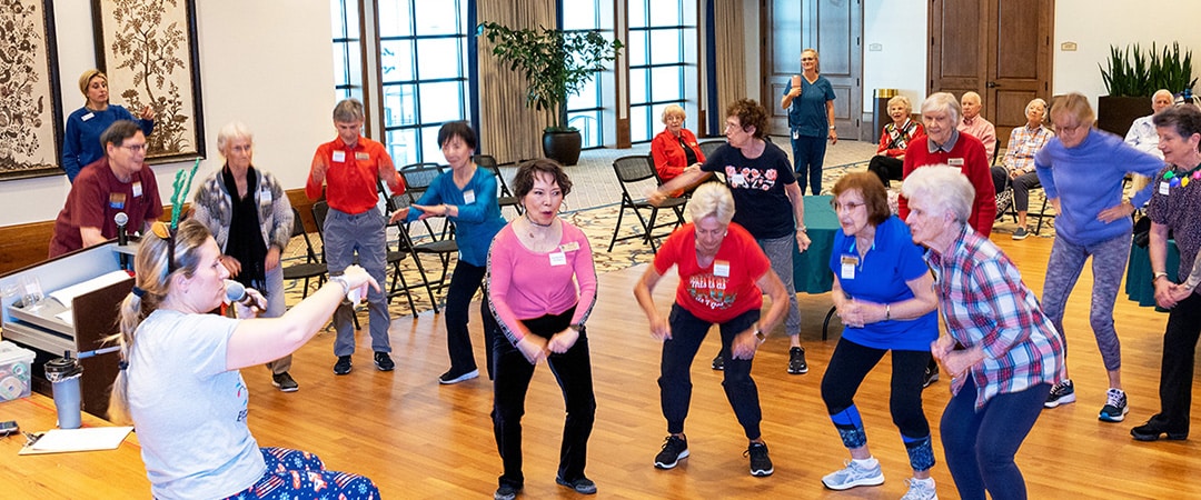 A group of residents doing exercises together